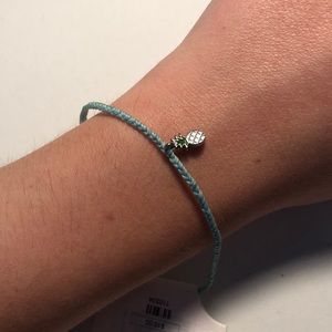 teal bracelet with pineapple charm